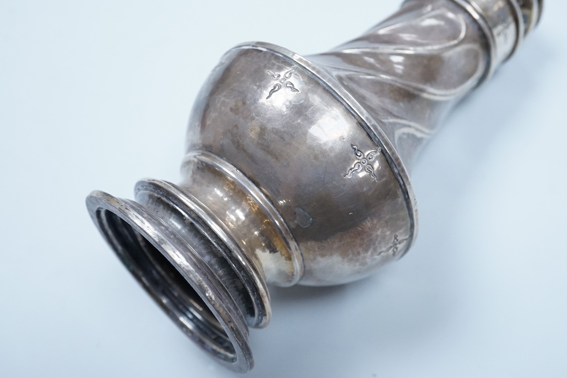 A George V Arts & Crafts silver sugar caster, by Omar Ramsden, with spiral decoration and engraved with stylised stars, London, 1931, 14.9cm, 5.3oz.